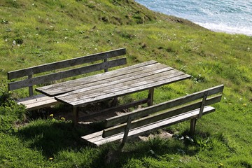 Fototapeta premium Wooden Bench Near the Sea