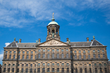 Fototapeta na wymiar The facade and dome of the 17th century Royal Palace of Amsterdam, otherwise known as the Dam Palace, in Amsterdam, Netherlands.