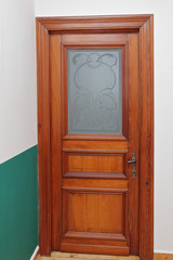 porte en bois ancienne avec vitrage et dessins art déco