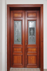 double porte en bois ancienne avec vitrage et dessins art déco