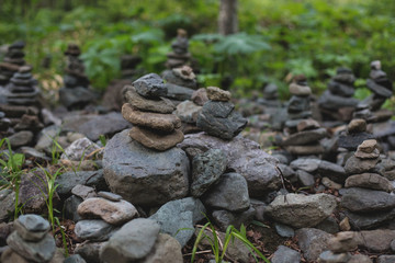 Fototapeta na wymiar Image of spiritual stones pyramid in the forest on Sakhalin island. Place of power