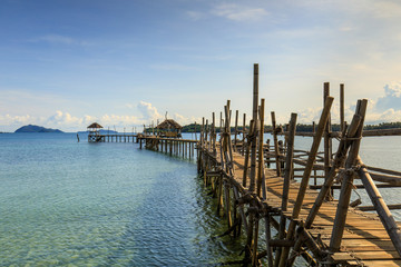 Fototapeta premium wooden bridge and cottage on tropical sea in Koh Mak island, Trat province,Thailand