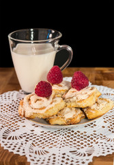 breakfast milk and biscuits with raspberries