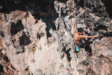 A climber climbs the rock.