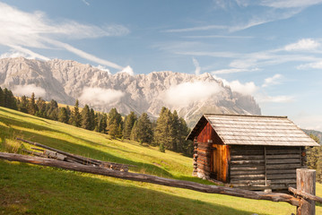 Fototapeta na wymiar St. Magdalena, Italy - August 27, 2015: mountain hut to the base of the Dolomites