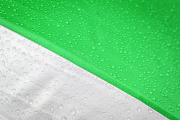 Fototapeta premium Abstract water drop on green and grey background