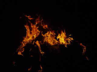 Isolated flames with burning grass blades, details