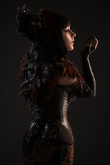 Rear view of brunette gothic woman