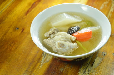 boiled radish with pork bone soup on bowl