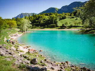 Lake Tenno surrounded by Italian alps.