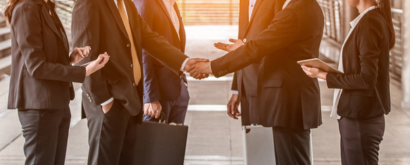 business people  handshake concept. shaking hand of group of businessman negotiation closing a deal...