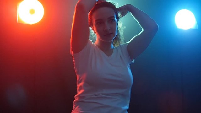 Young and beautiful woman modern dancer