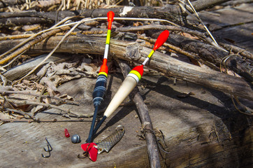 composition with fishing gear on the background of a wooden surface