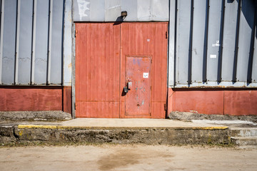 Old metal warehouse door, hangar gate