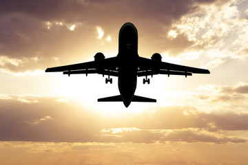 Airplane in the sky. Copy space of business summer vacation and travel adventure concept. Airplane sky and sunshine 