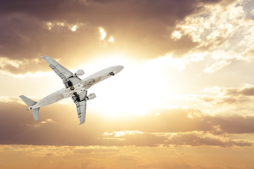 Fototapeta na wymiar Airplane in the sky. Copy space of business summer vacation and travel adventure concept. Airplane sky and sunshine