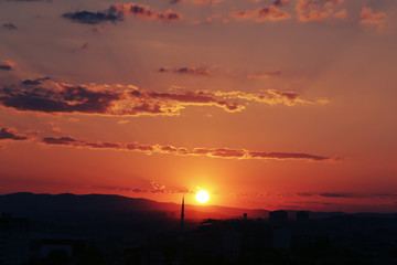 Fototapeta premium Sunset over Ankara Turkey skies. beautiful landscape with a red sunset sky over the field 