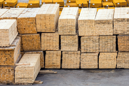 Wooden boards stacked in the port of loading