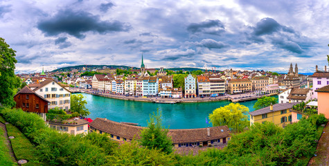 Fototapeta na wymiar Panoramic view of historic Zurich city center with famous Fraumunster, Grossmunster and St. Peter and river Limmat at Lake Zurich, Canton of Zurich, Switzerland