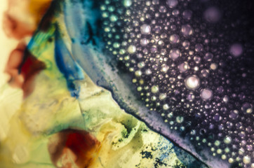 the chemical reaction of the paint with water