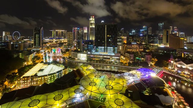 Elevated night view over the city skyline and riverside restaurants at the entertainment district of Clarke Quay, Singapore, South East Asia