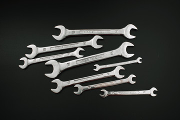 key carob for repair and on a black background