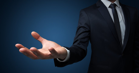 Businessman without head holding something without theme