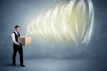 An illustrated powerful whirlwind escaping, coming out of empty paper box held by elegant...