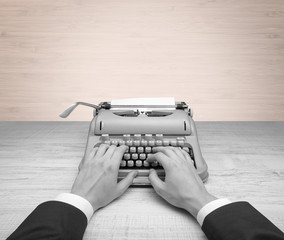 First person perspective elegant hand writing on an oldschool typewriter with copyspace
