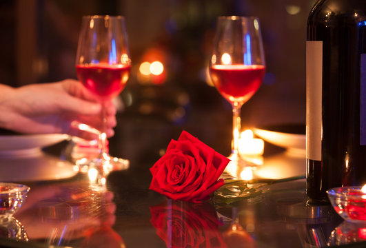Romantic candlelight dinner restaurant setting.  Valentines Day, and date night concept. 