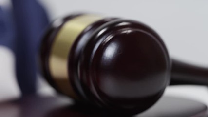 American Gavel Flag and Justice System in court room on white screen - Powered by Adobe