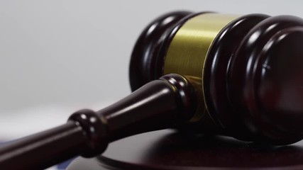 American Gavel Flag and Justice System in court room on white screen - Powered by Adobe