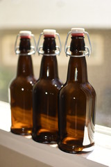 brown bottles in window
