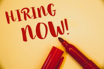 Handwriting text Hiring Now Motivational Call. Concept meaning Workforce Wanted Employees RecruitmentIdeas messages words red letters created on vintage background open pen.