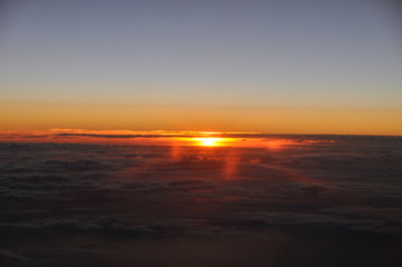 Fototapeta na wymiar Sunset from a plane