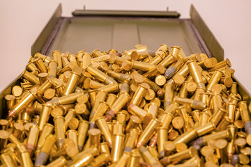 Open ammo box full of bullets