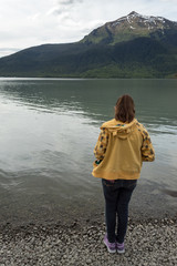 Girl looking at a lake