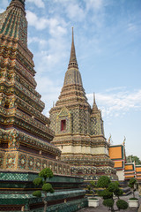 Fototapeta premium Pagoda is in Wat Pho that was named as the temple of the pagoda or chedi that are decorated with yellow glaze or glazed tiles or dark blue. 