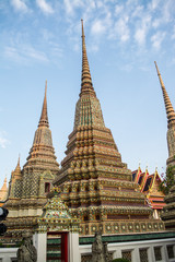 Fototapeta premium Pagoda is in Wat Pho that was named as the temple of the pagoda or chedi that are decorated with yellow glaze or glazed tiles or dark blue. 