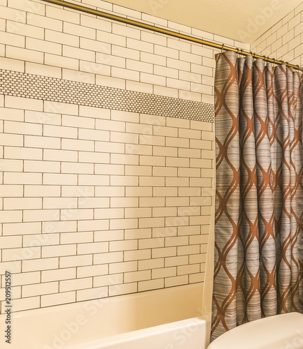 Shower Curtain In Tiled Bathroom Of Model Home Stock Photo And Shower Curtain In Tiled Bathroom Of Model Home