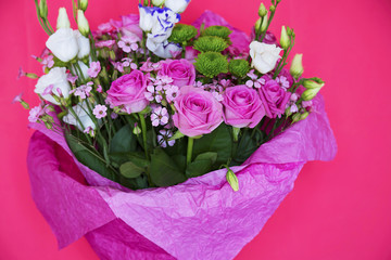 beautiful bouquet of flowers pink roses on a pink background