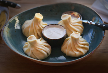 Photo of macro tasty khinkali with vegetables