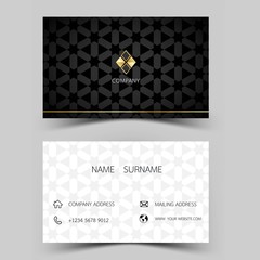 Luxurious  business card. gold and white color on the gray background.