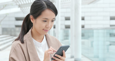 Woman working on cellphone