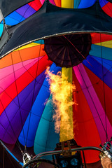 Fire inside a colorful hot air balloon