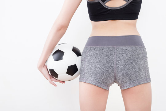 Sexy woman body with soccer ball