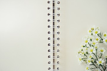 blank space notebook for writing text and drawing with white beautiful cutter flowers