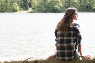 Fototapeta premium Woman playing near river