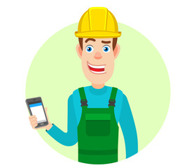 Builder holding mobile phone in hand