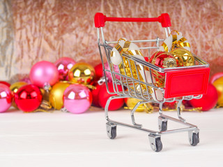 Shopping cart with Christmas gifts and presents, Christmas and New Year sale.